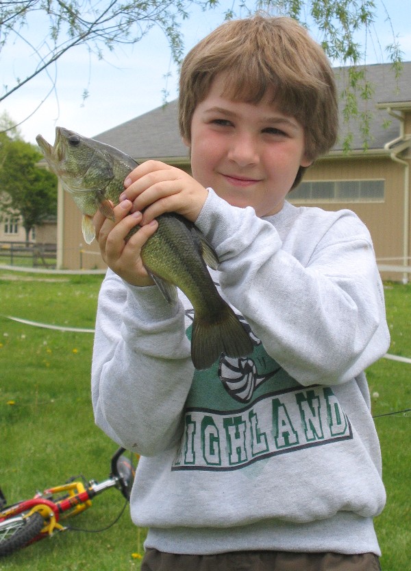 The fish is prettier then the guy catching it!